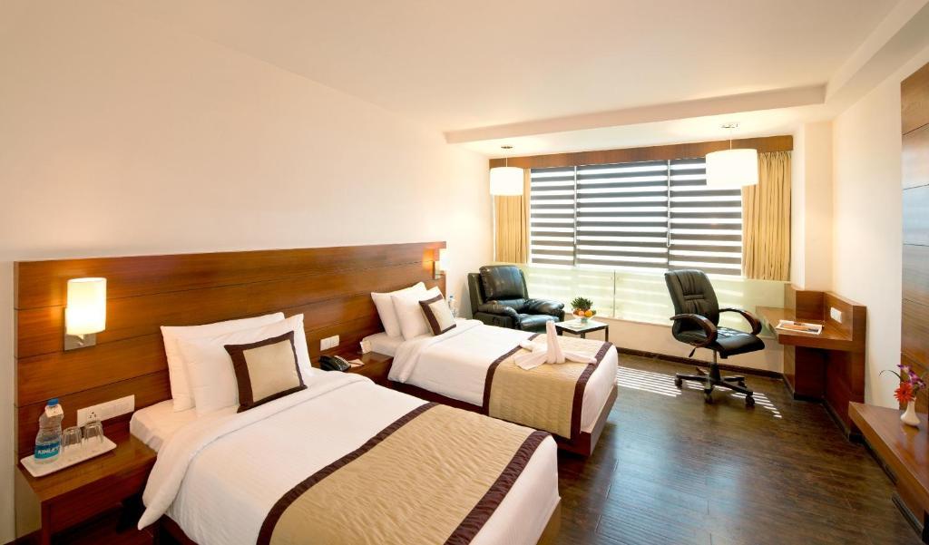 Hotel Sandy'S Tower Bhubaneswar Habitación foto